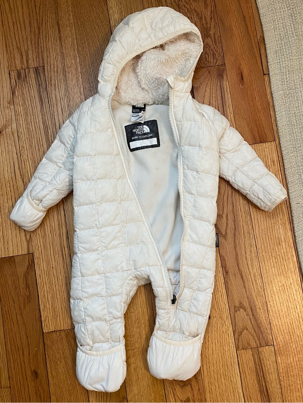 The North Face Cream Quilted Hooded Baby One-Piece Bunting, size 6-12 months